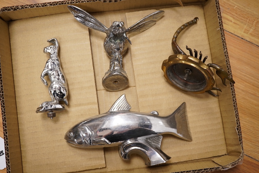 Five animal themed chrome and brass car mascots consisting of a giraffe mounted on a turned aluminium base, a hare, a bumblebee in flight, a leaping fish, and a scorpion. Condition - fair to good.